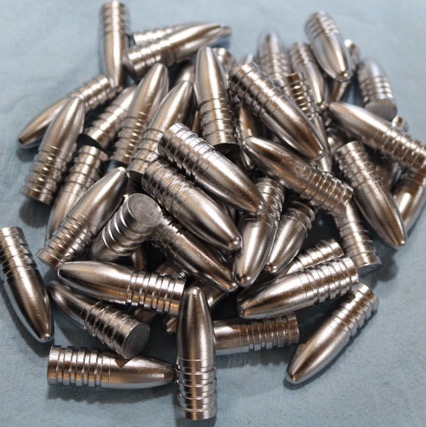 Custom-turned solid rifle projectiles.
